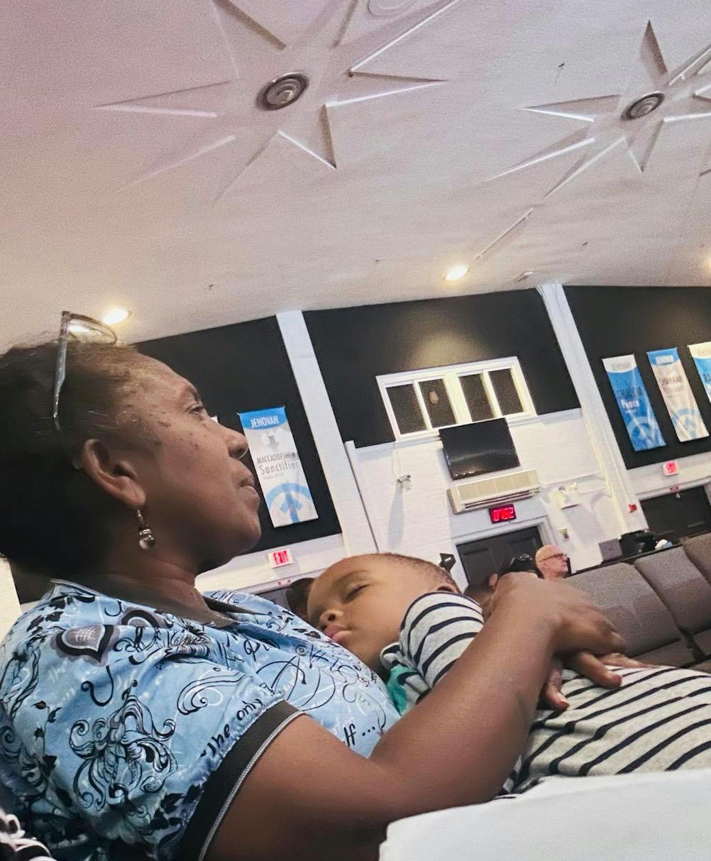 Person holding a sleeping child