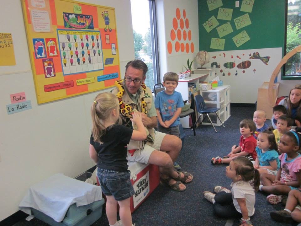 Adult and children in a classroom
