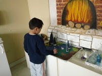 Child playing with toys on a counter