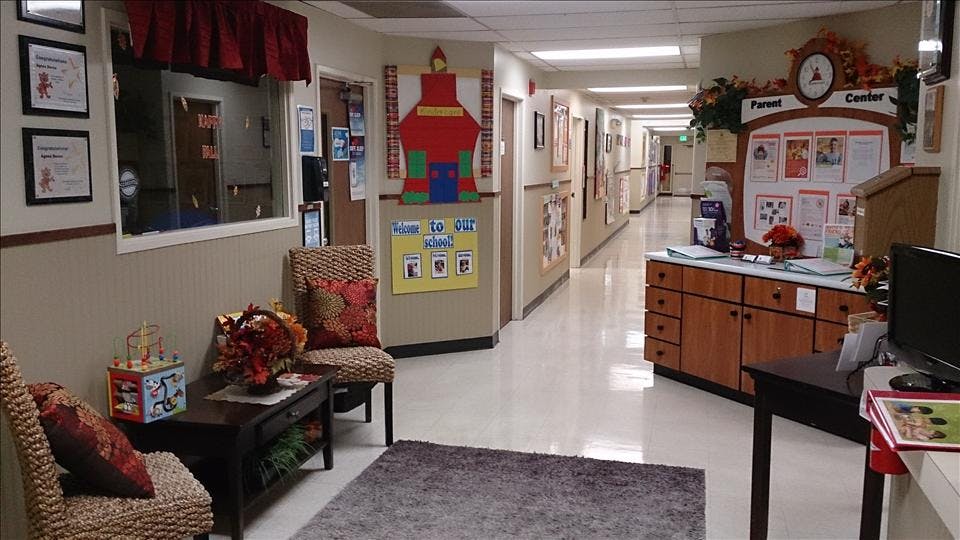 Hallway decorated for fall with a "Parent Center" display