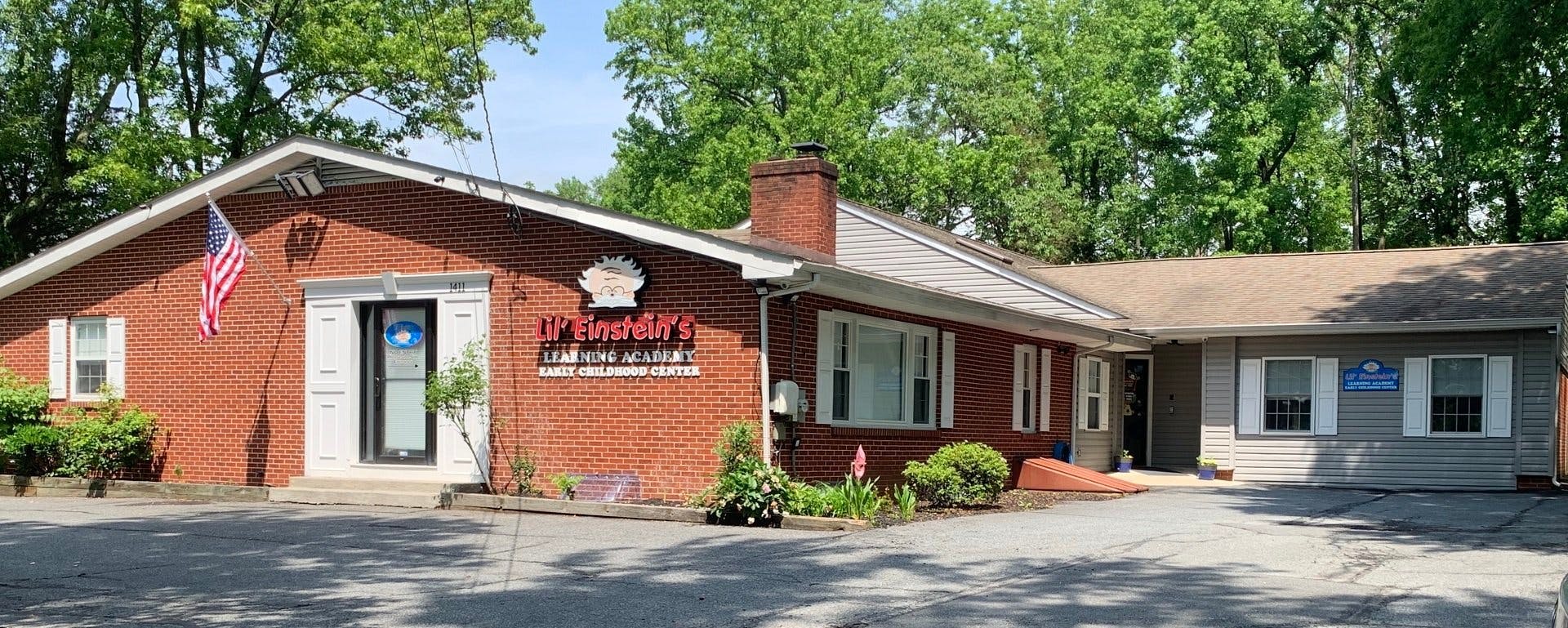 Brick building with an American flag and a sign that reads "Mr. B's"