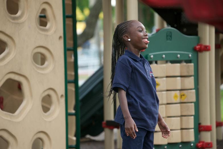 Child standing on a playground
