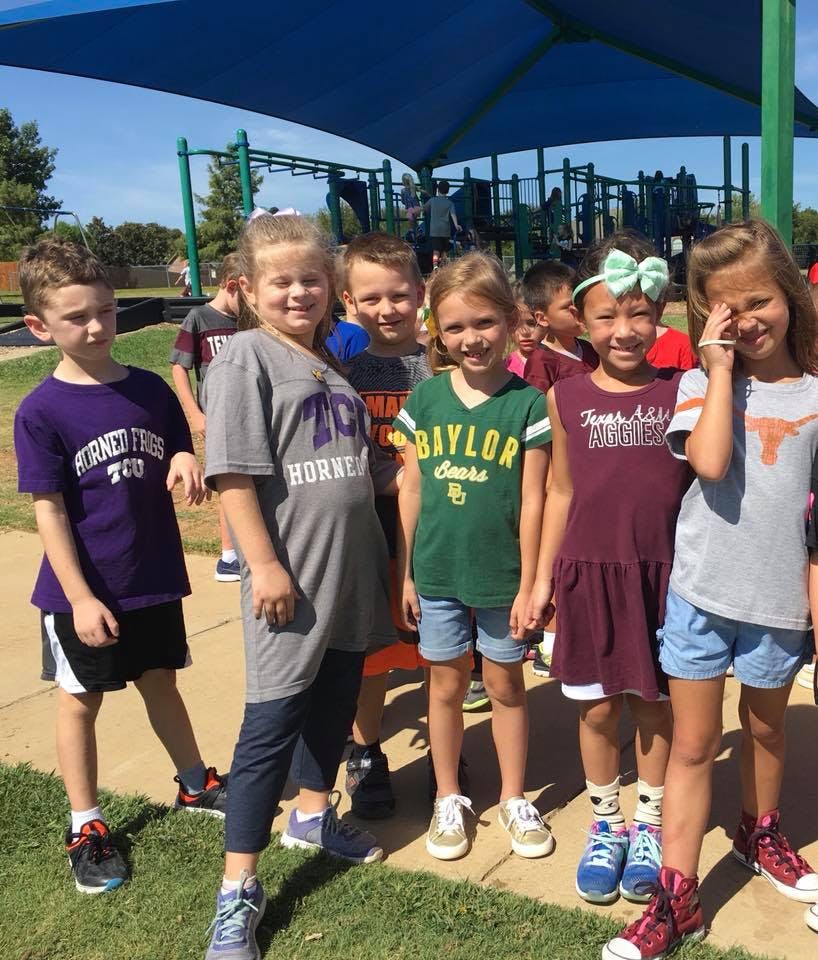 Group of children standing outdoors