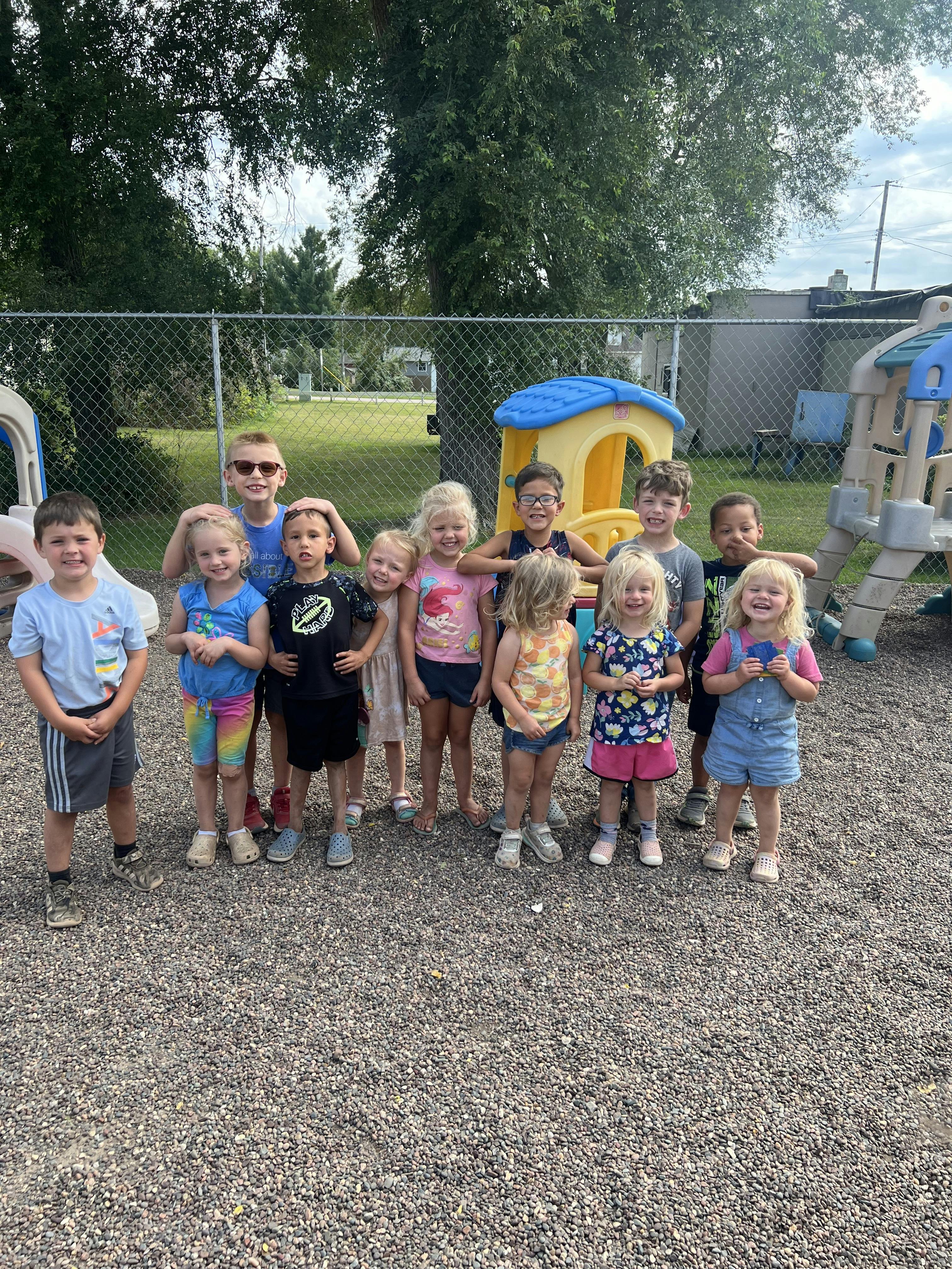 Group of children standing on a playground