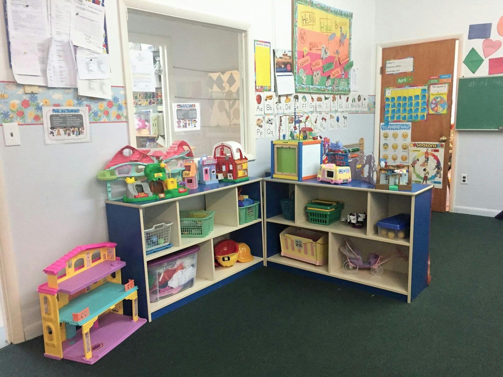 Classroom with shelves of toys and learning materials