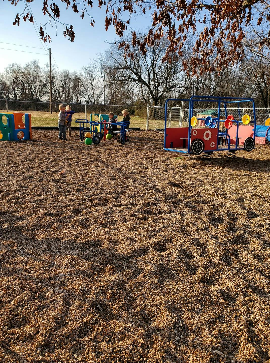 Children playing on playground equipment