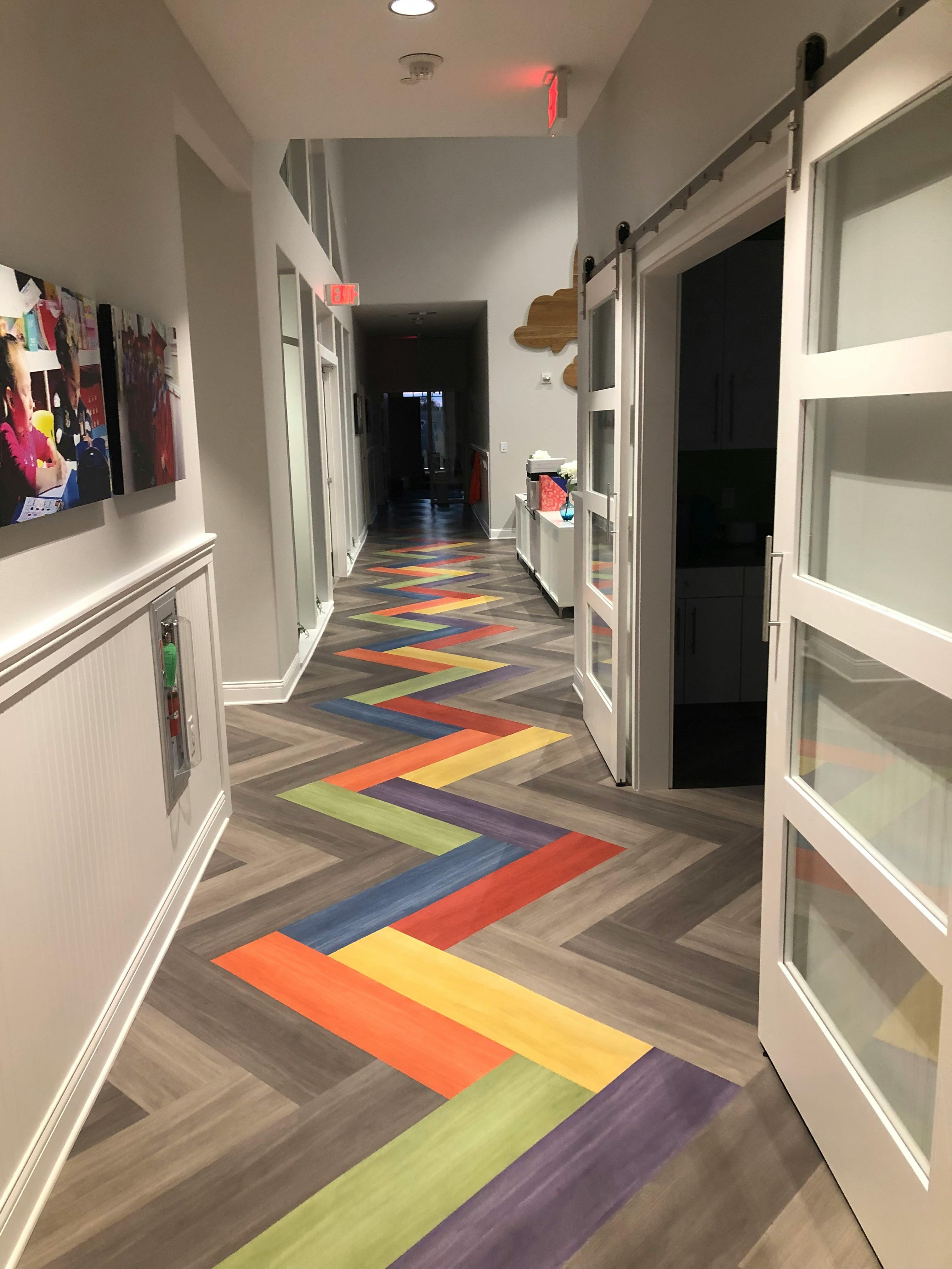 Hallway with colorful zigzag pattern on the floor