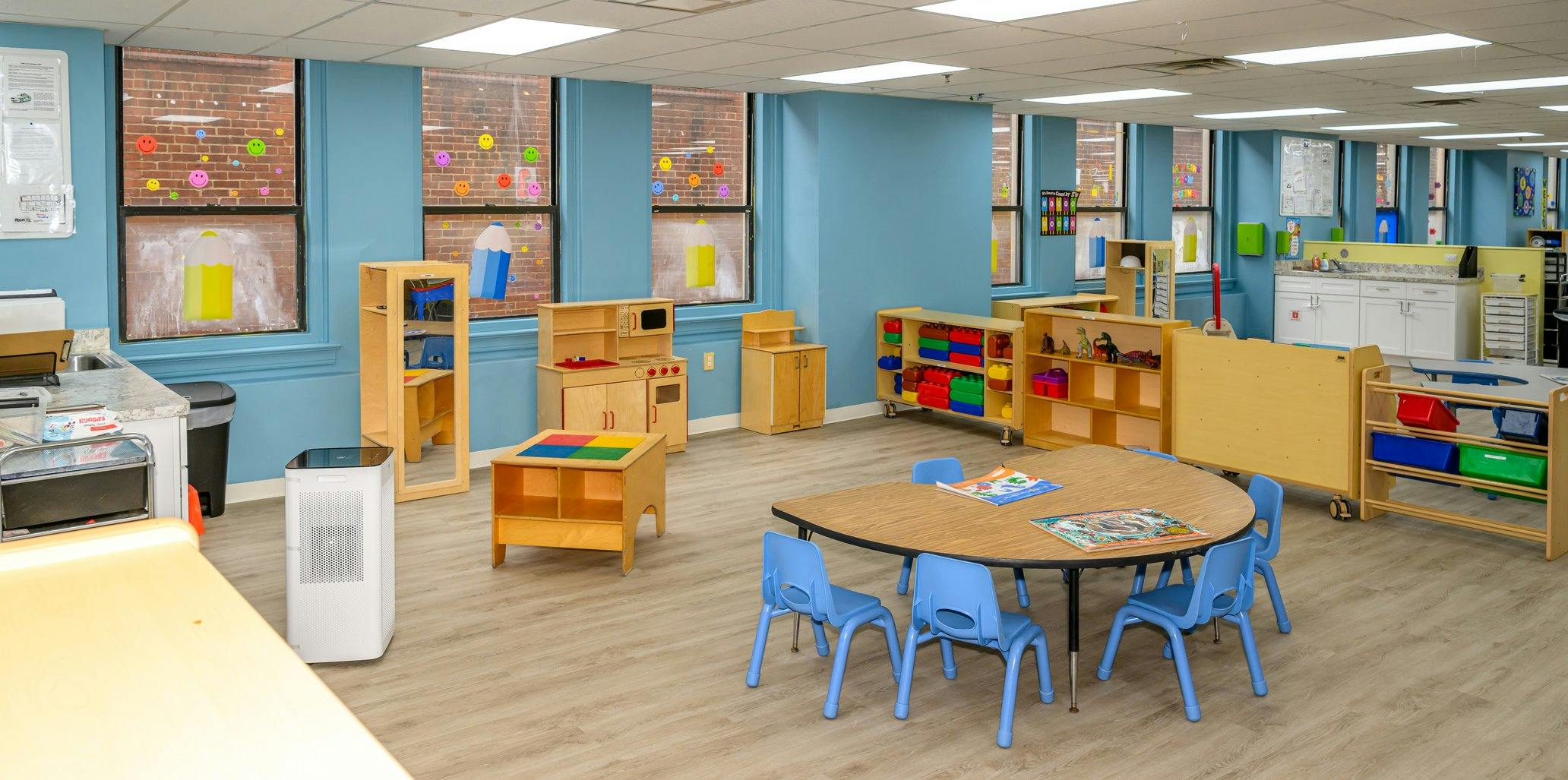 Classroom interior with children's furniture and educational toys