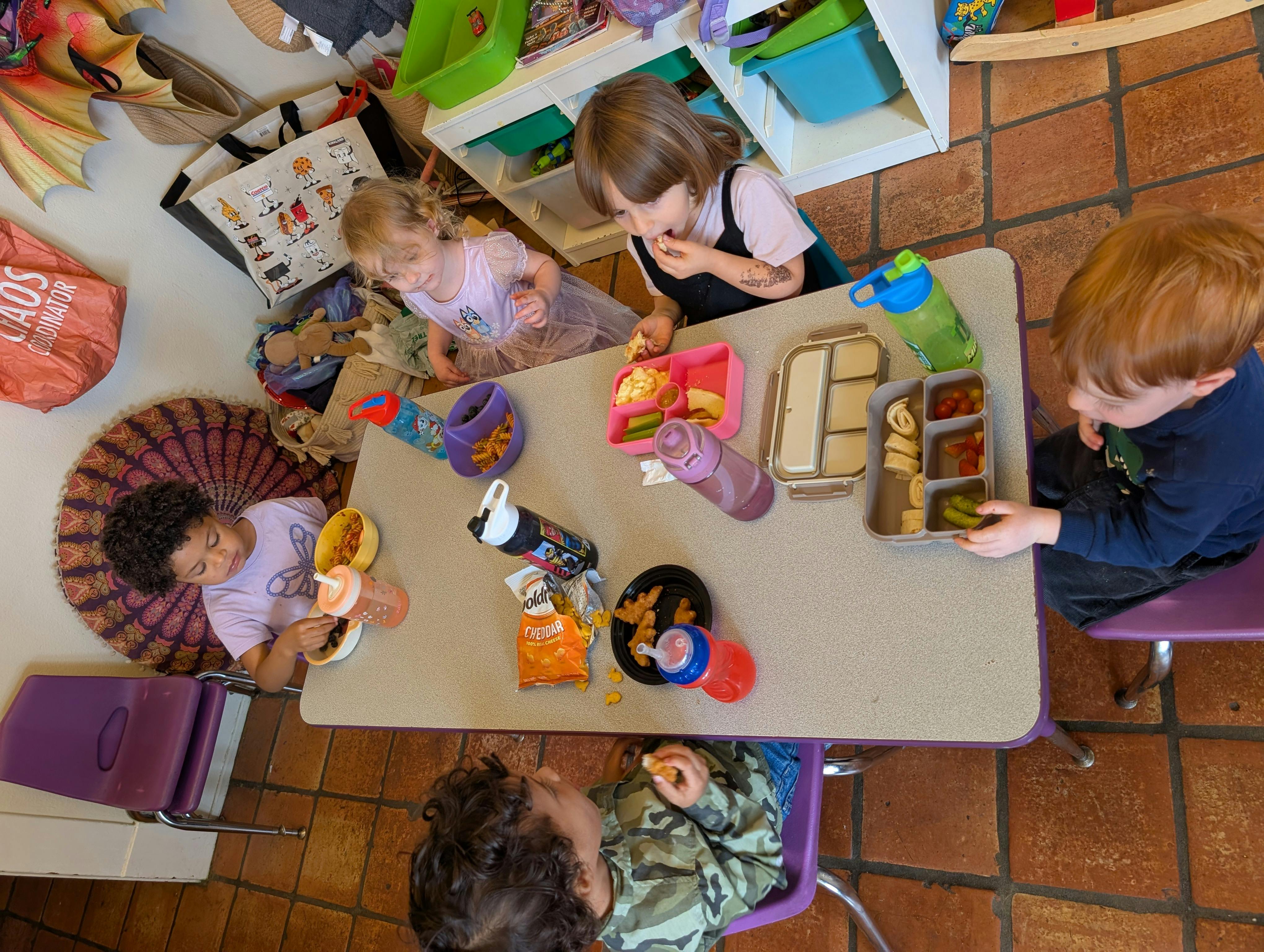 Children eating lunch at a table