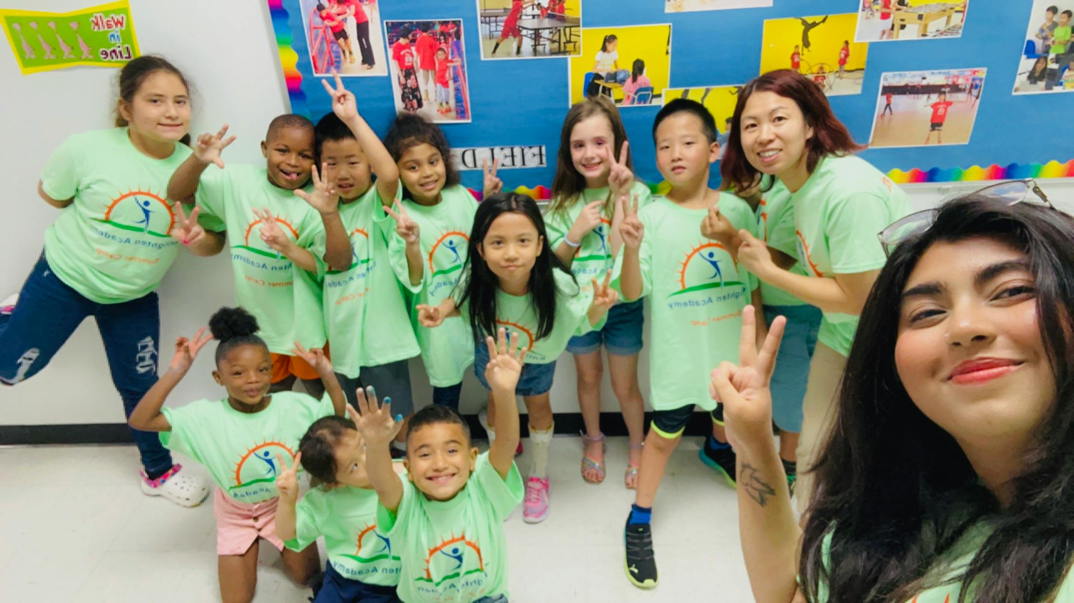 Group of children and adults posing for a photo