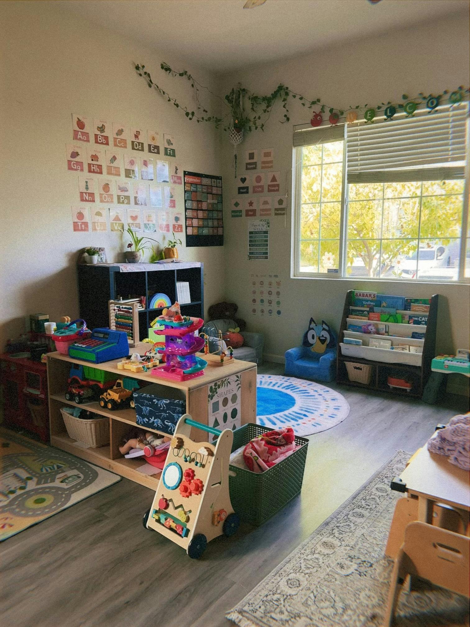 Playroom filled with educational toys and alphabet wall charts