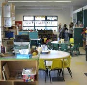 Classroom with small tables and chairs