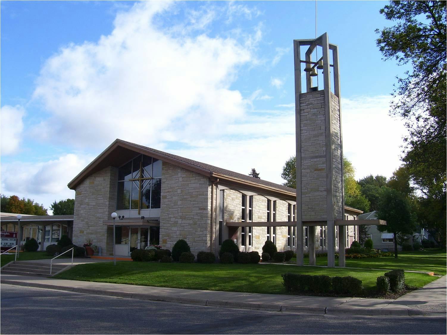 Building with a tall bell tower next to it
