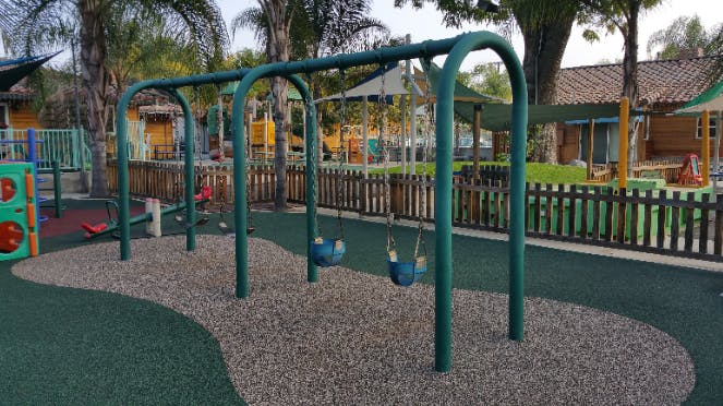 Empty swing set on a playground