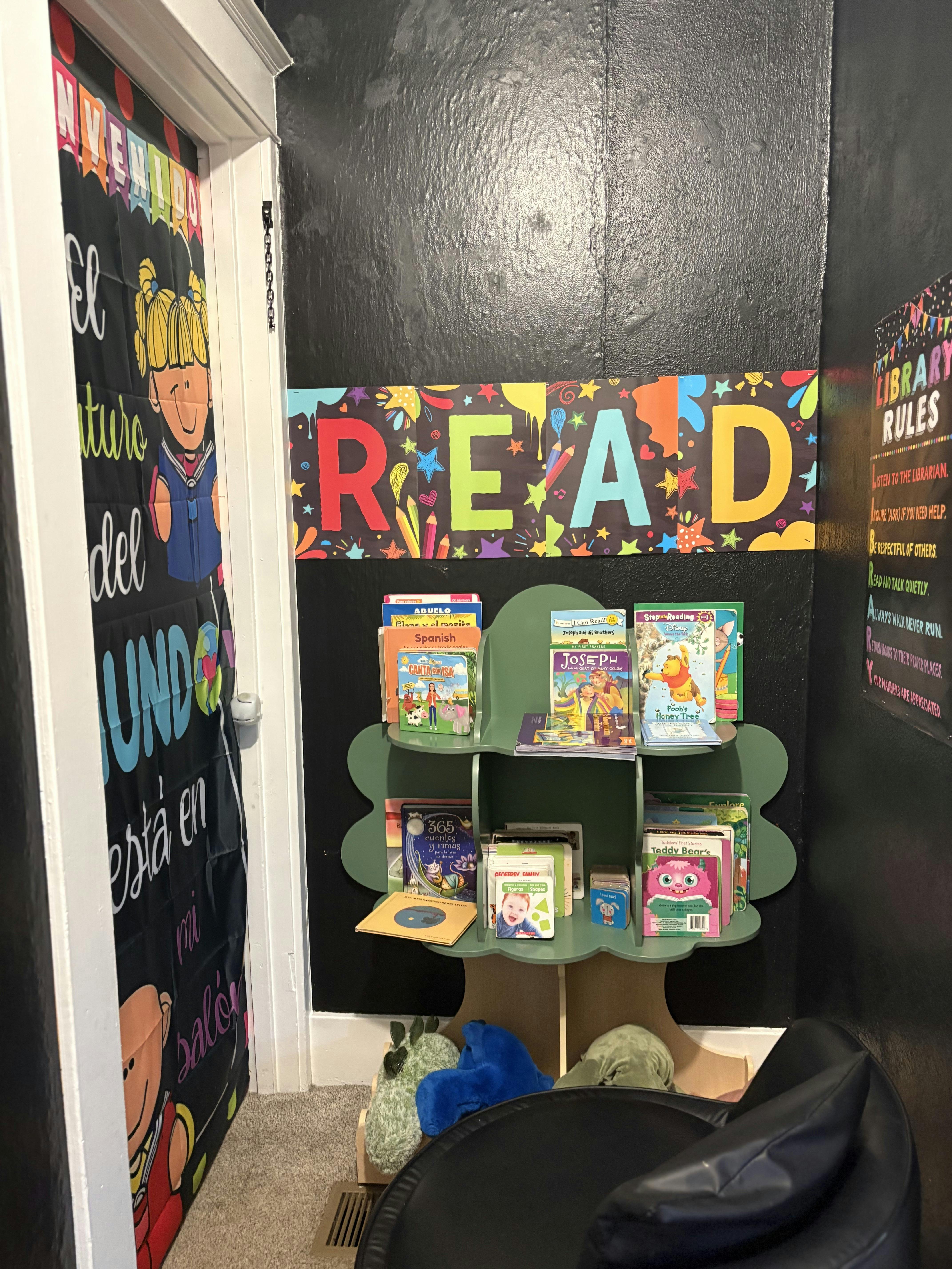 Small library corner with a bookshelf containing children's books