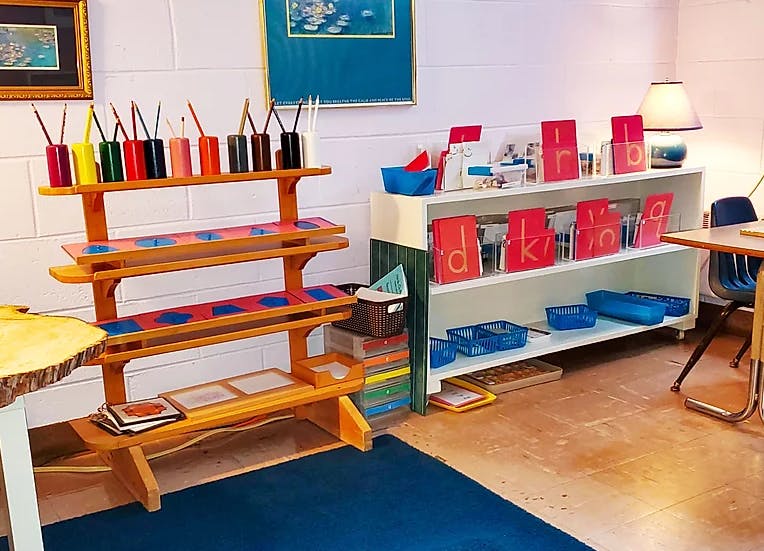 Classroom with shelves of learning materials and art supplies