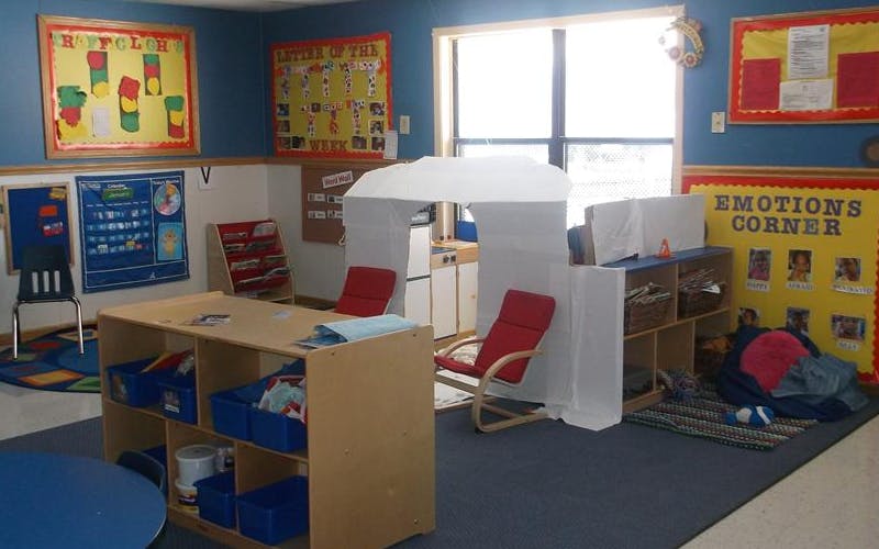 Children's classroom with activity center and reading corner