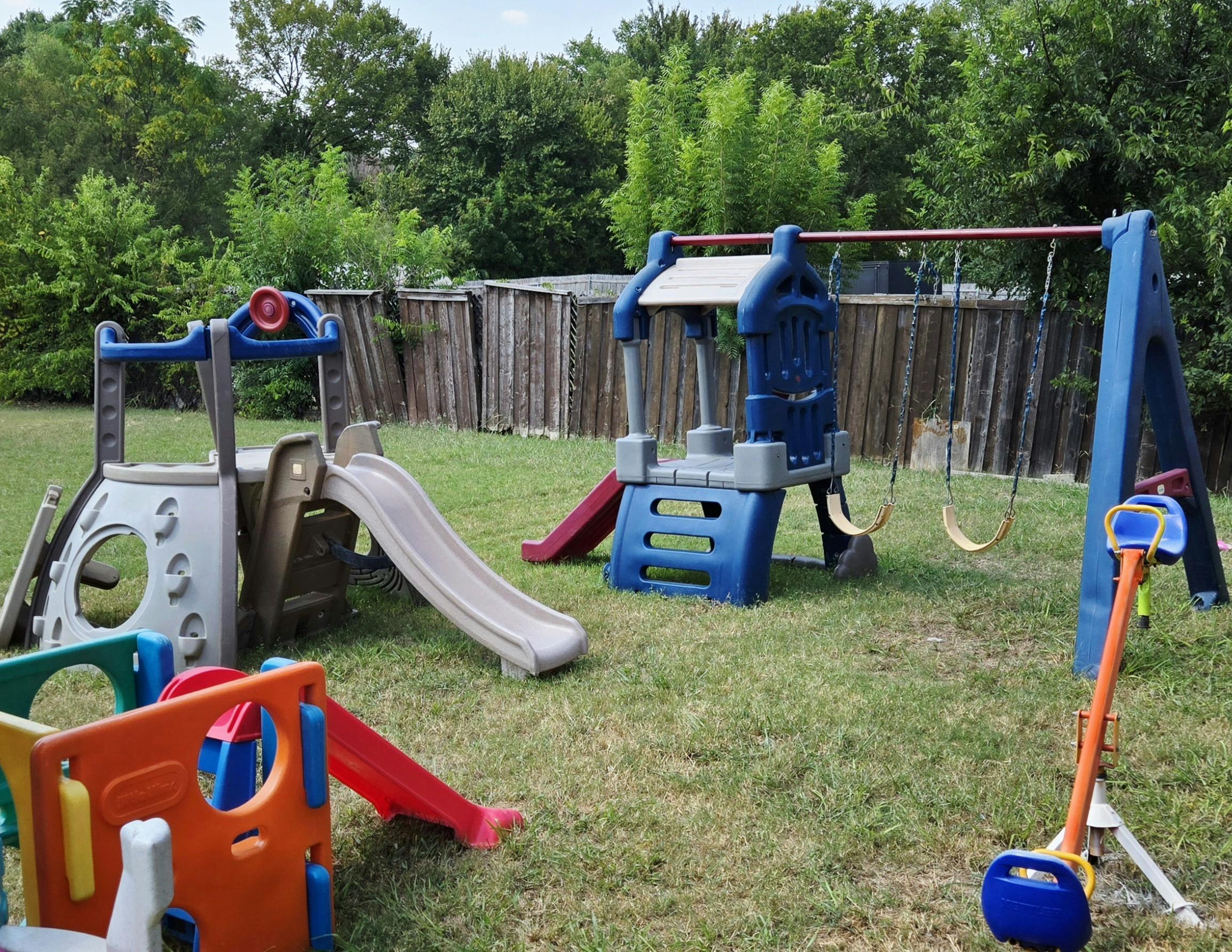 Outdoor playground with slides and swings