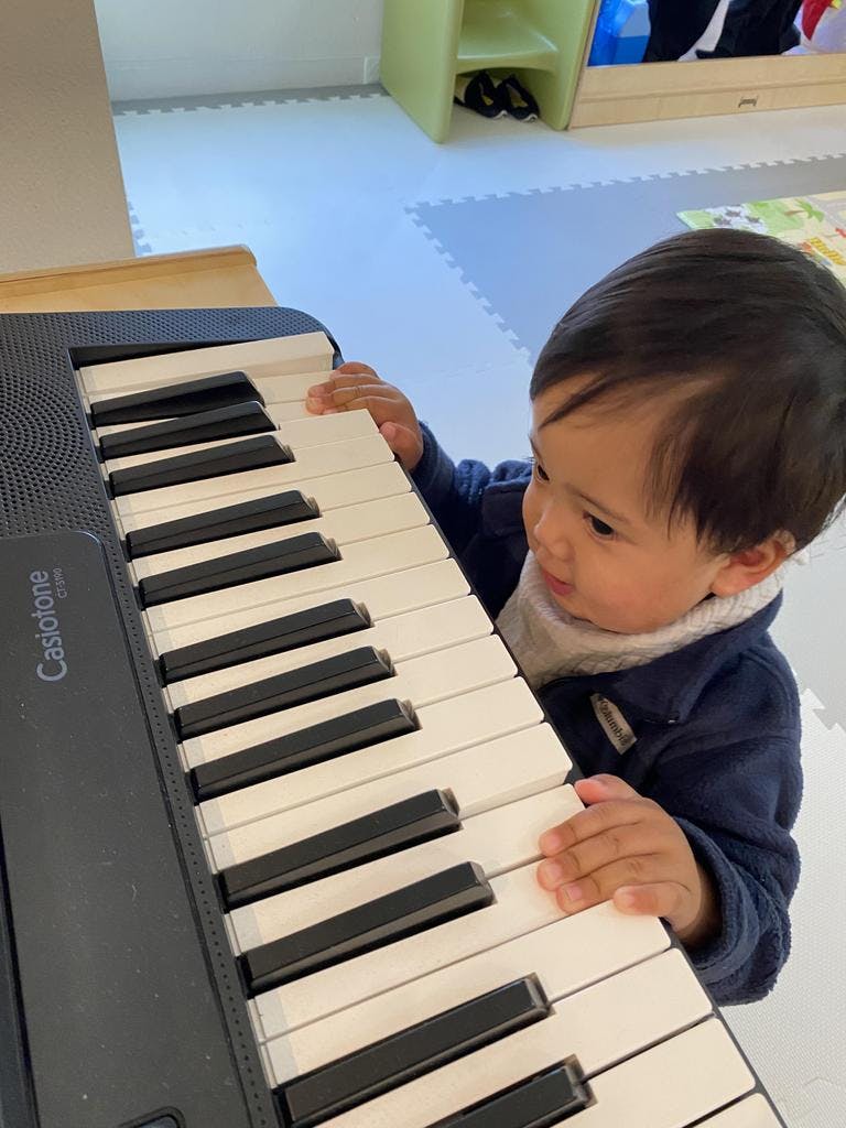 Child playing with a keyboard
