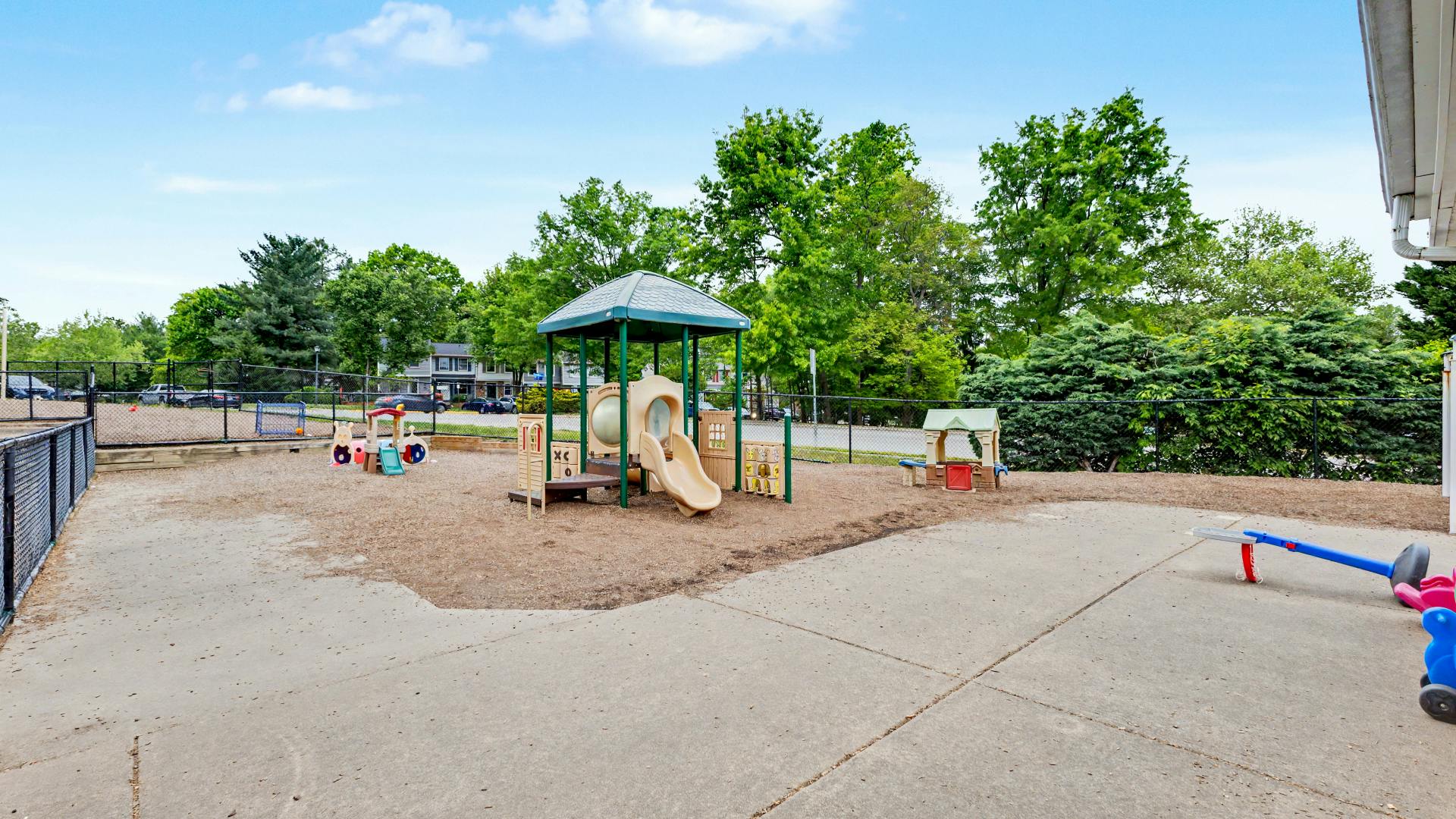 Playground with swings, slides, and other play equipment