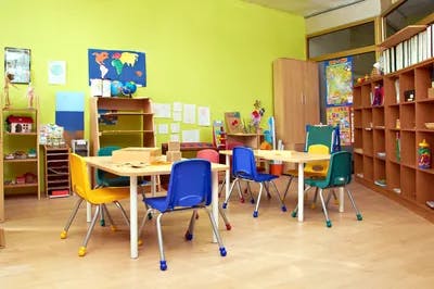 Classroom with small tables and chairs