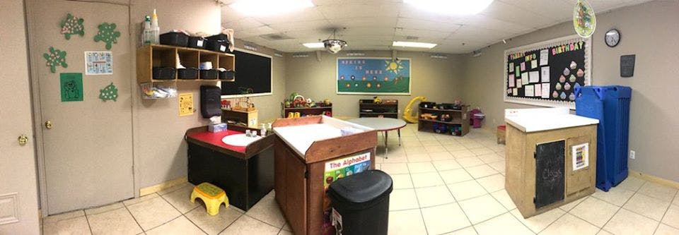 Classroom with various learning stations and decorations