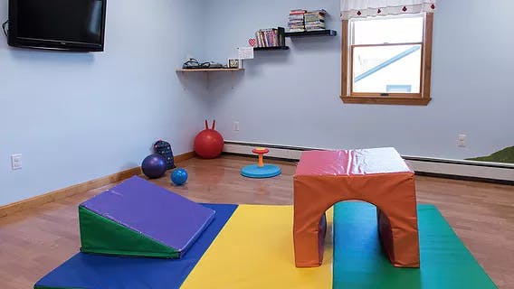Indoor play area with soft play equipment and exercise balls