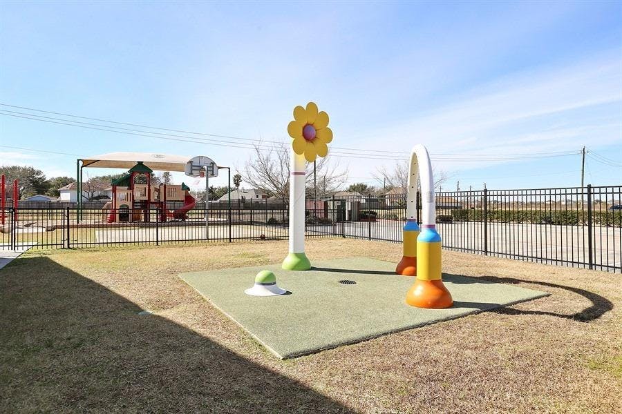 Playground with water features and play structure