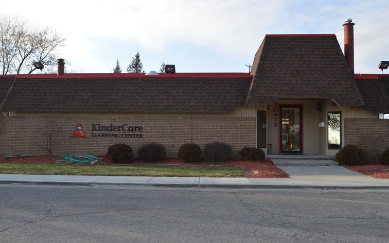 KinderCare Learning Center building with brick facade and brown roof
