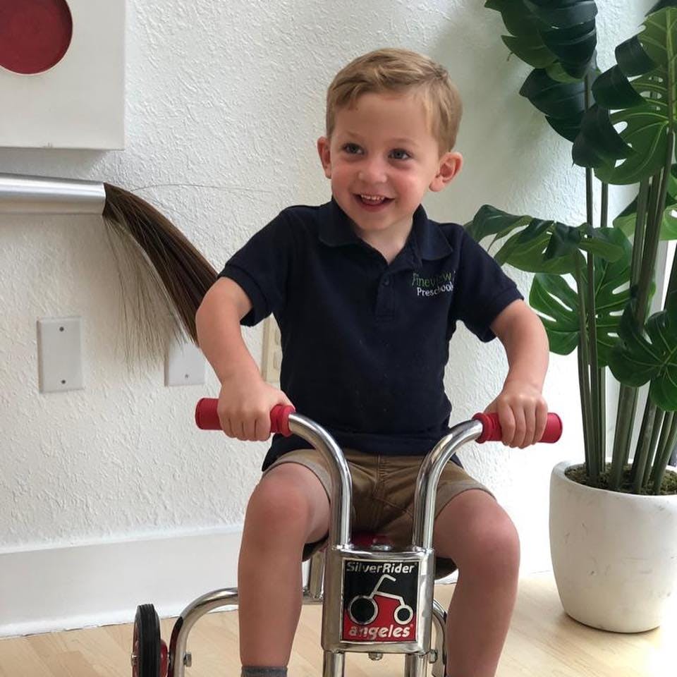 Child on a tricycle
