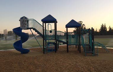 Playground structure with slides and climbing areas