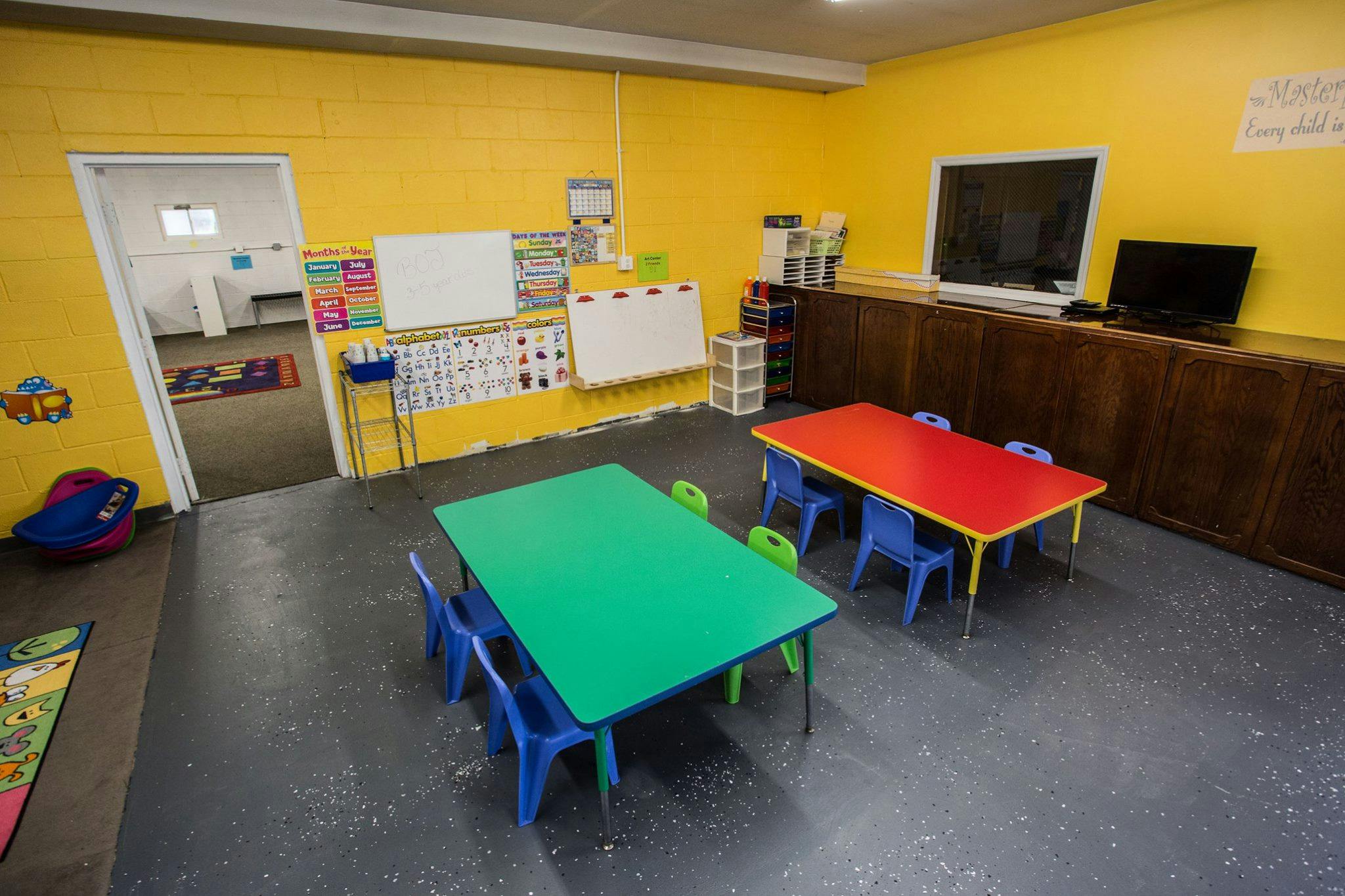 Classroom with small tables and chairs