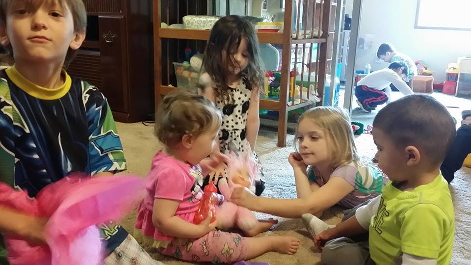 Children playing together on the floor