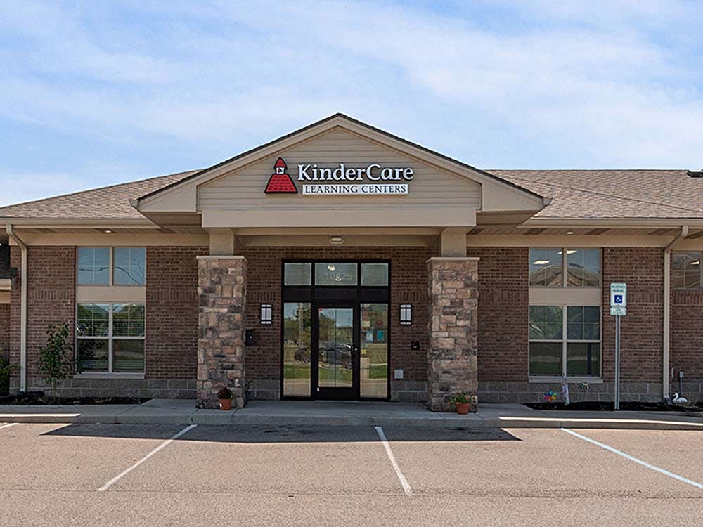 KinderCare Learning Centers building exterior with a parking lot in front