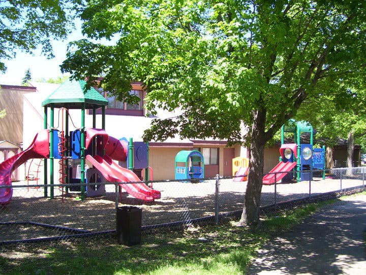 Outdoor playground with colorful slides and play structures