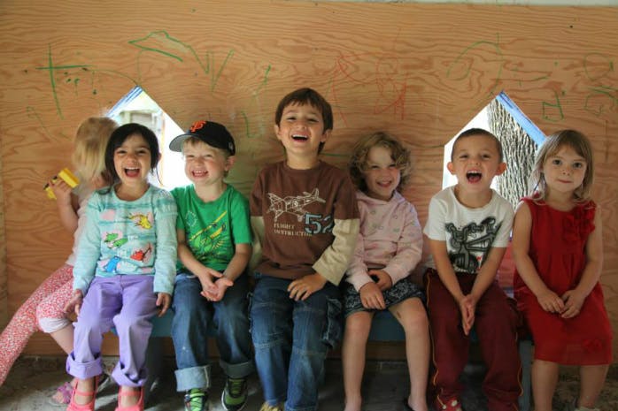 Group of children sitting together