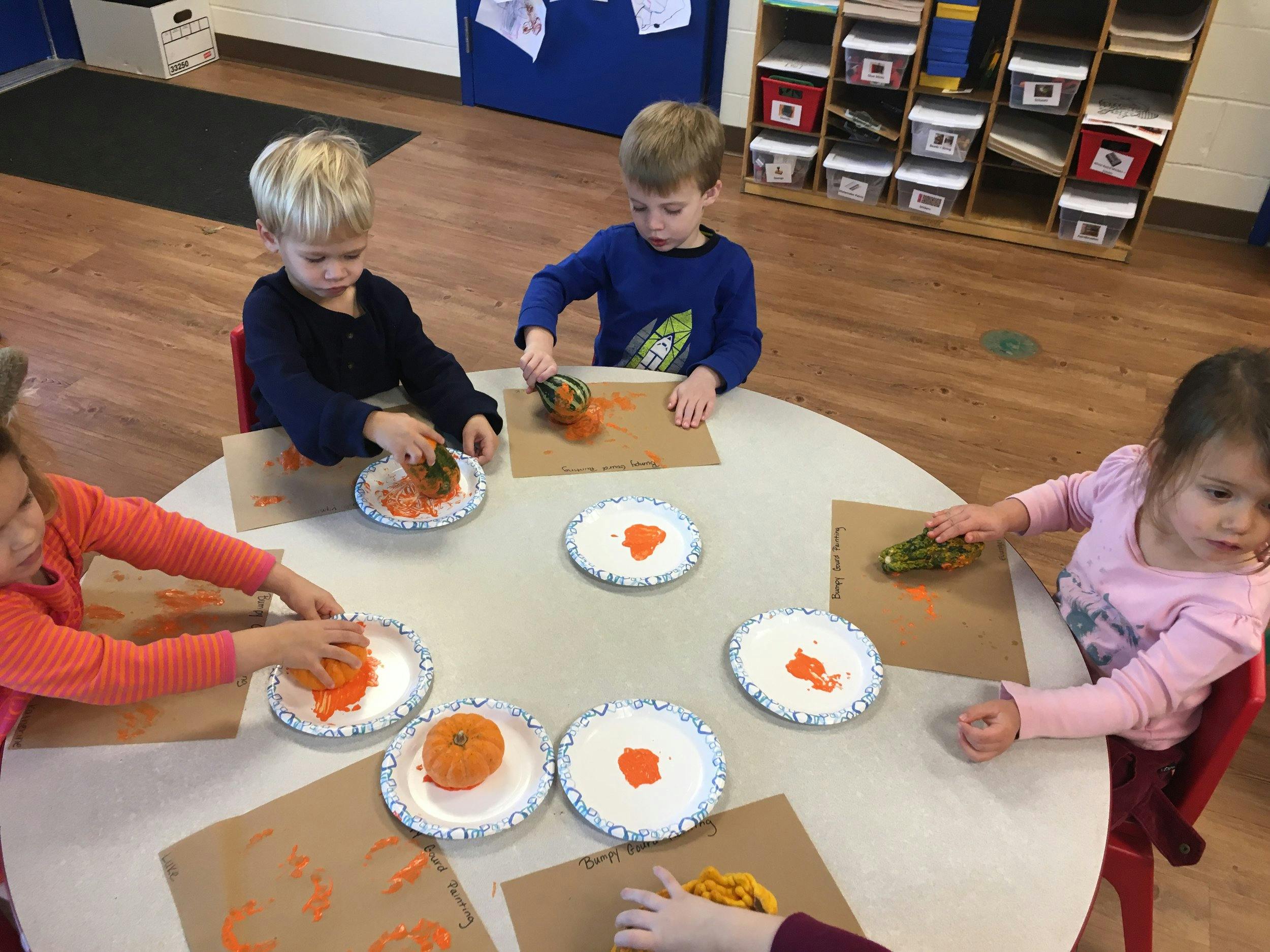 Children doing crafts at a table