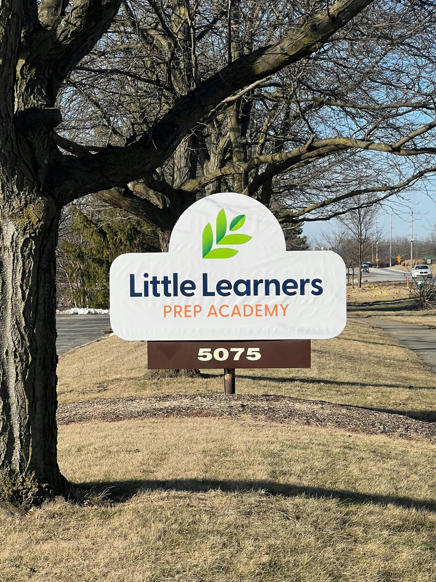 Sign for Little Learners Prep Academy with address 5075
