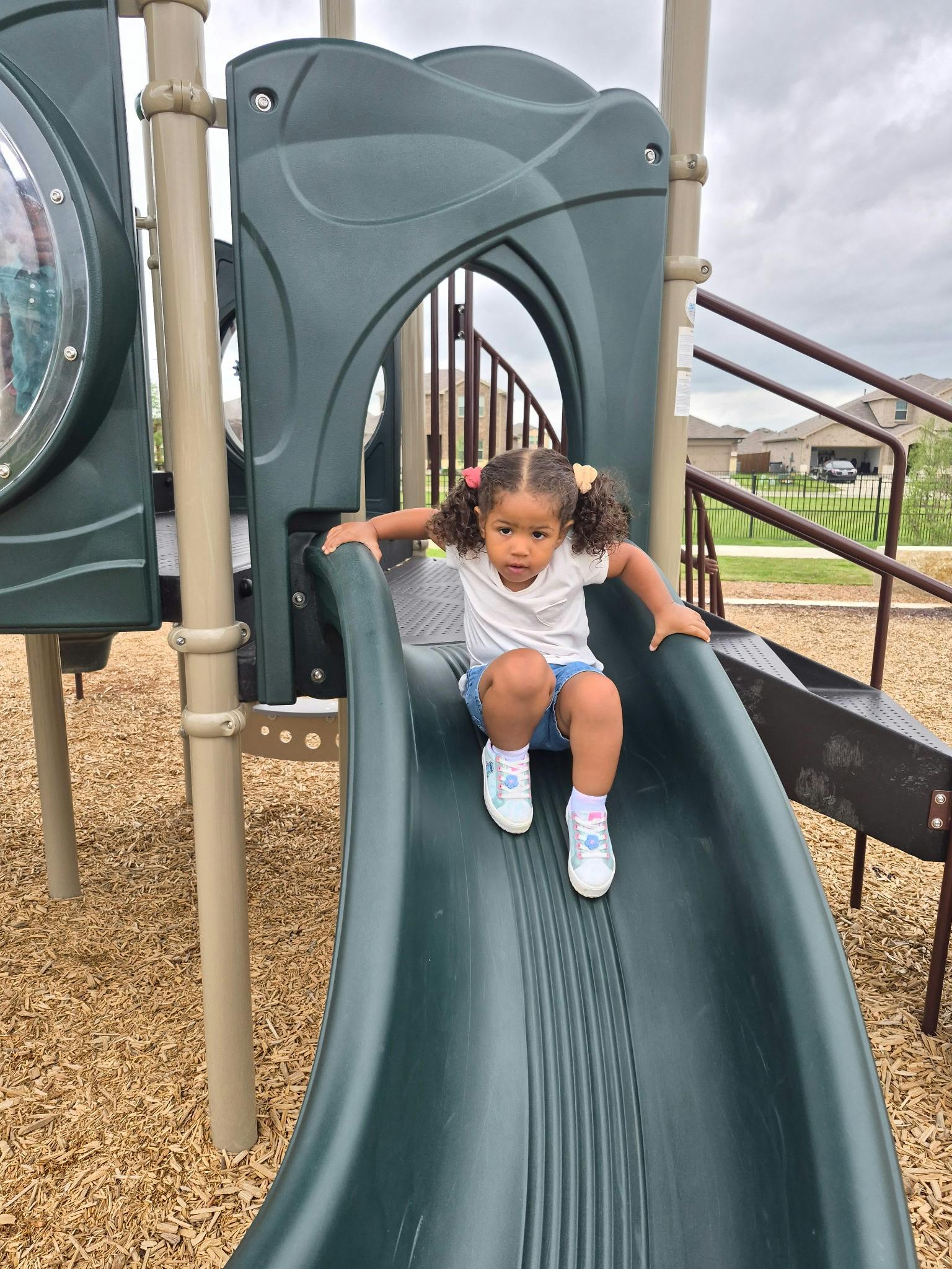 Child on a playground slide