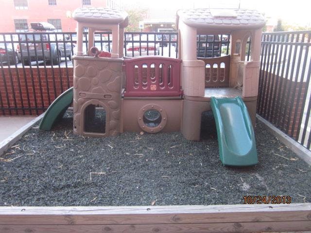 Playground structure with slides and climbing areas