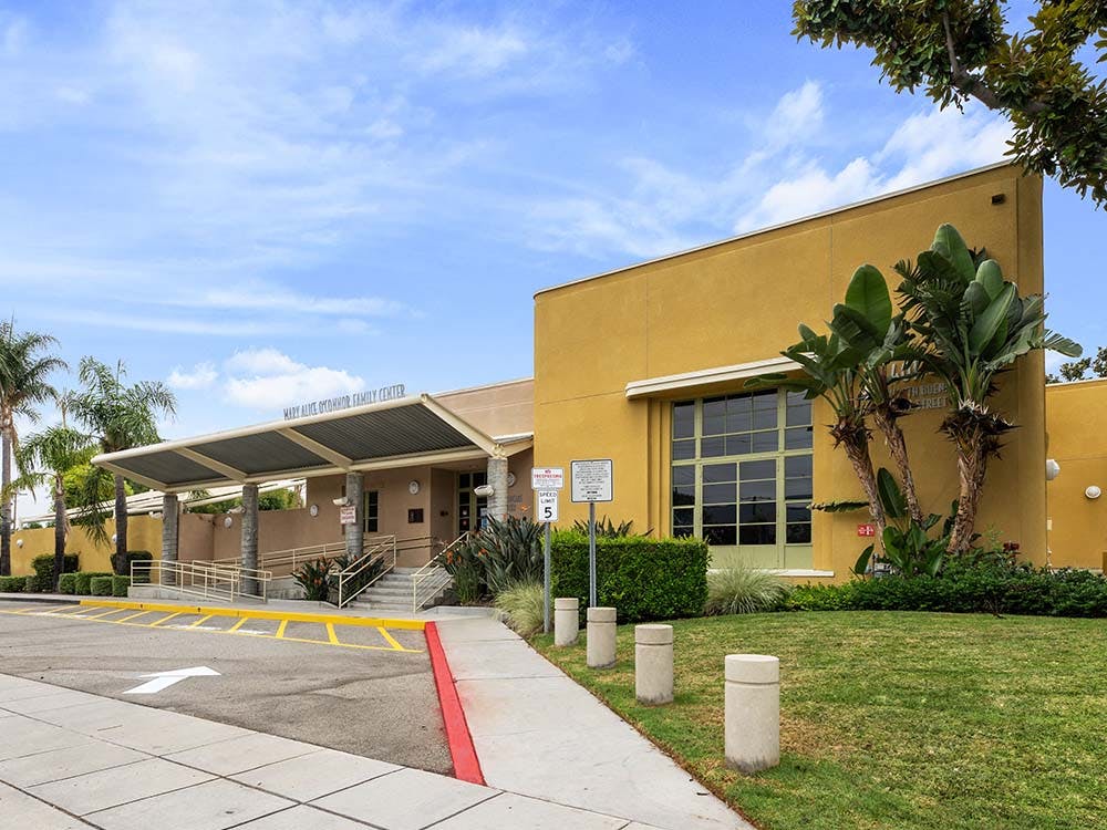 Mary Alice O'Connor Family Center building exterior with palm trees