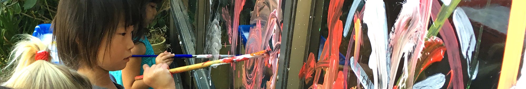 Person painting on a canvas