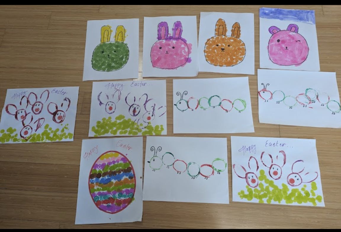 Multiple drawings of bunnies, caterpillars, and an Easter egg