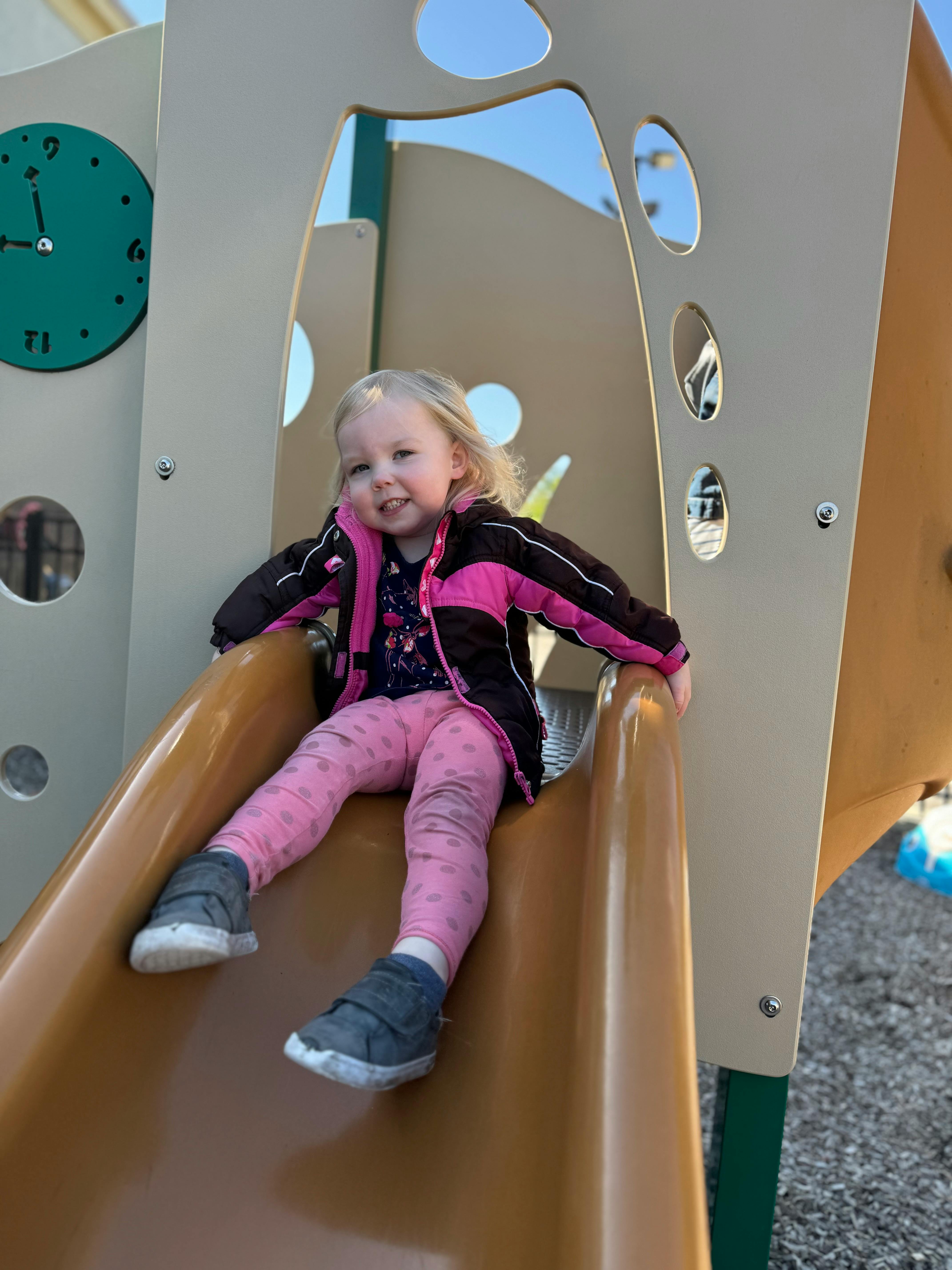 Child on a playground slide