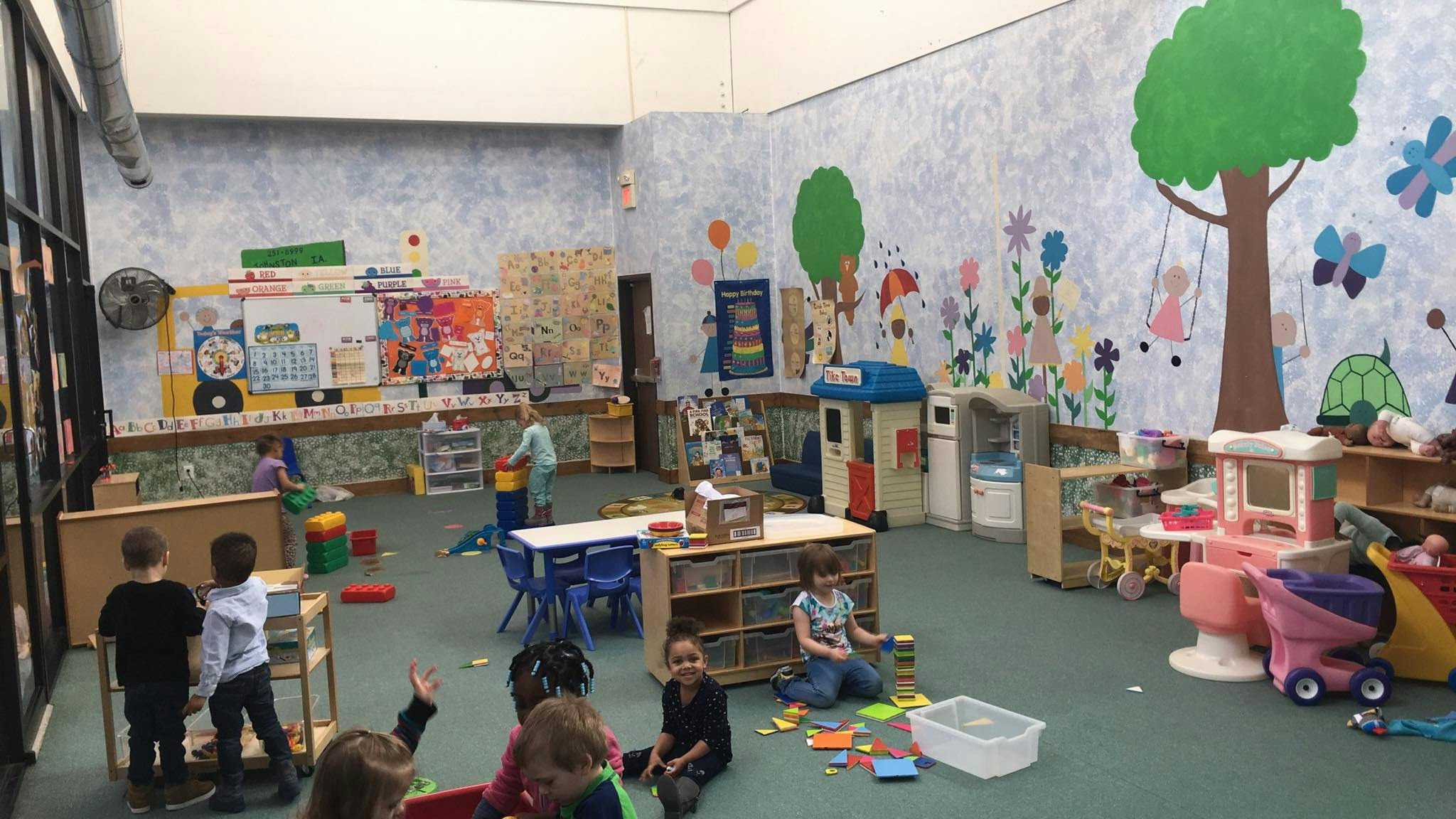 Children playing in a classroom