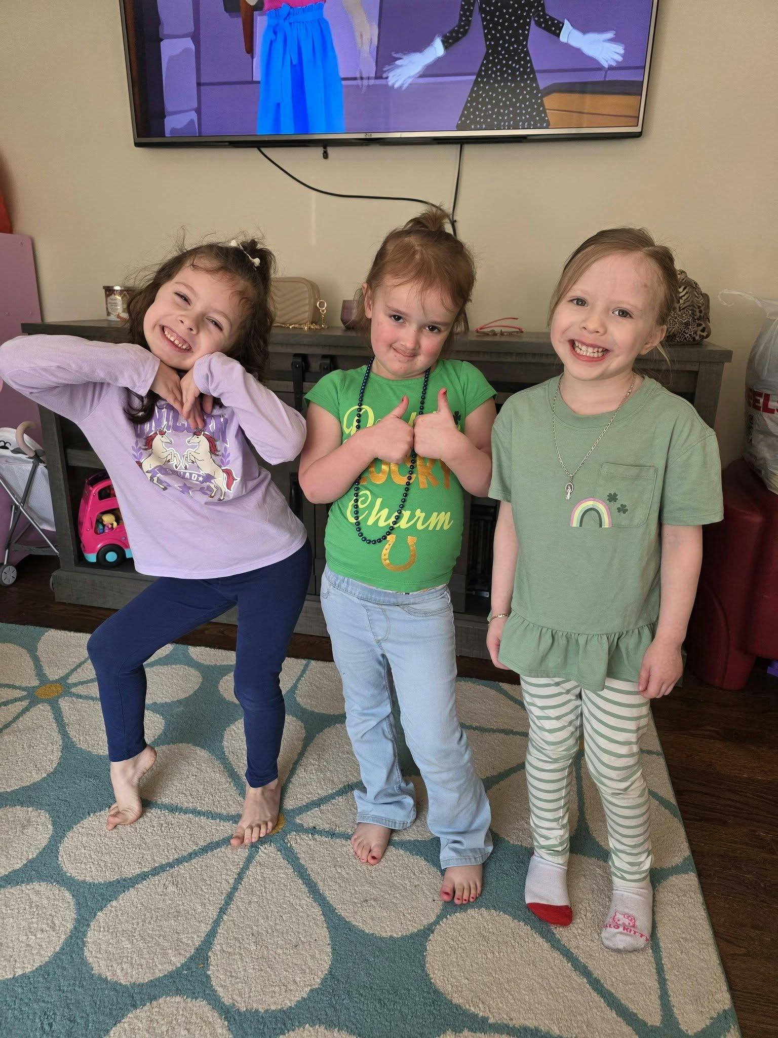 Three children posing for a photo