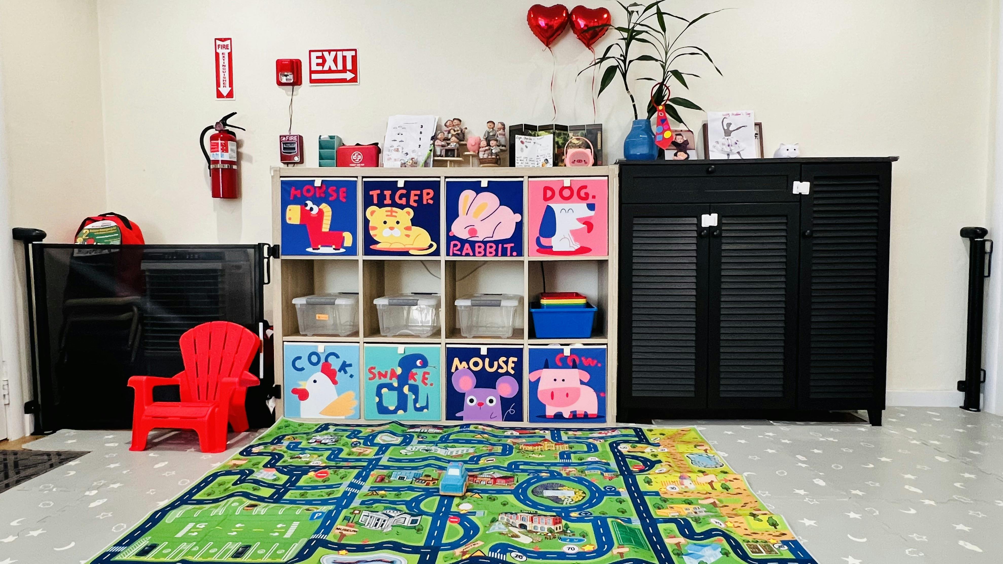 Childrens toy storage organizer and play mat in a classroom
