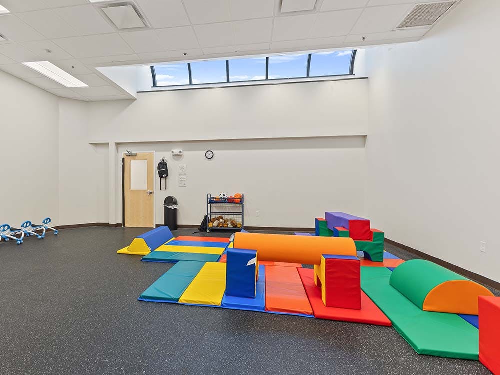 Indoor play area with colorful soft play equipment