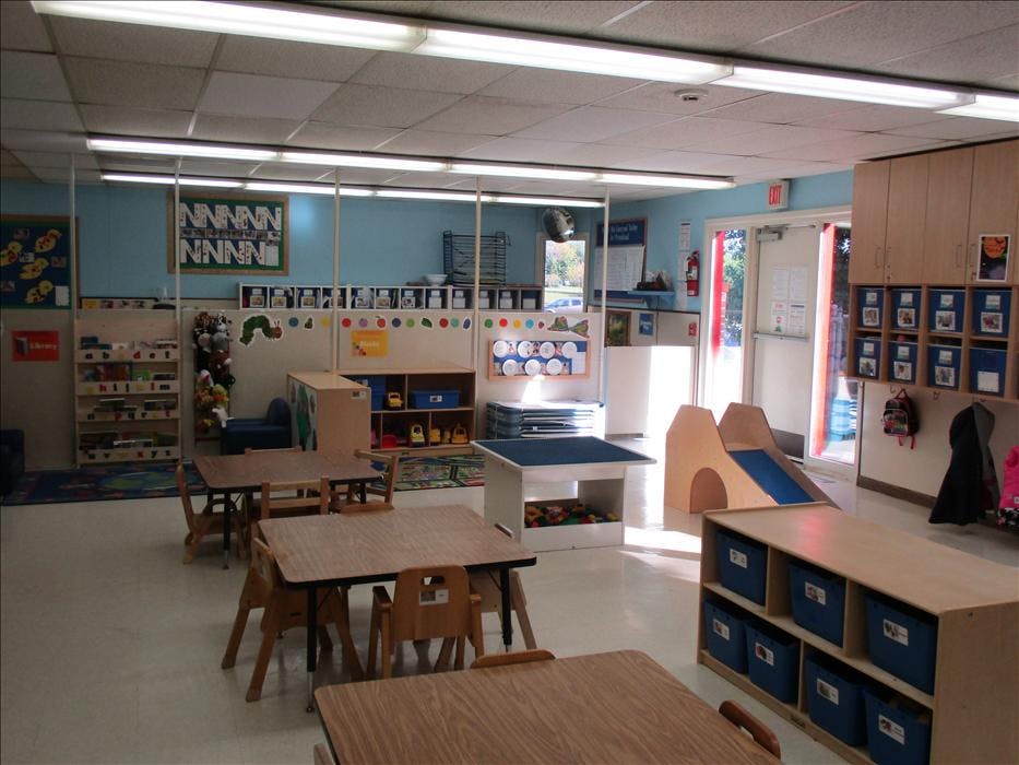 children's classroom with small tables and chairs
