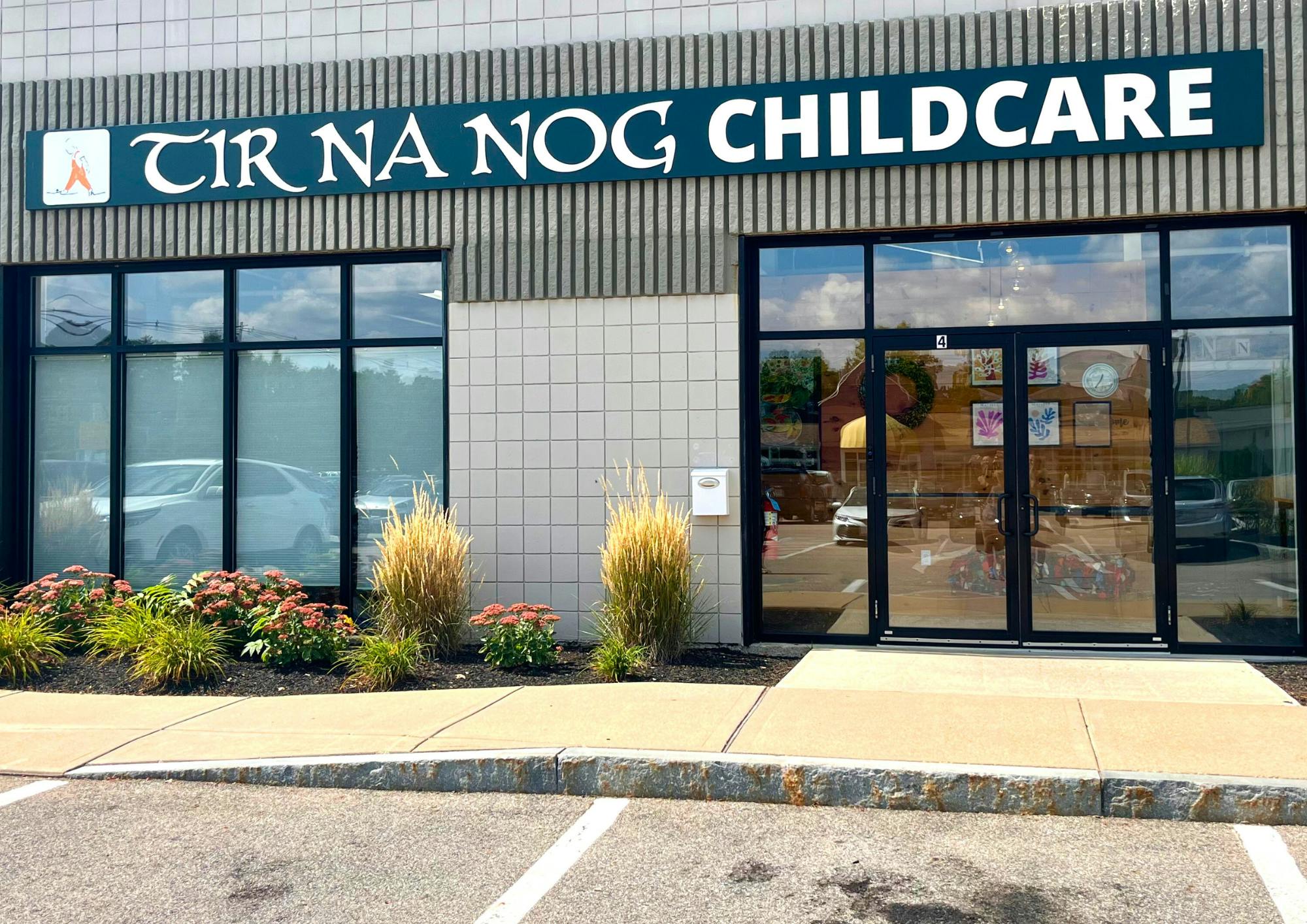 Tir Na Nog Childcare sign on building exterior